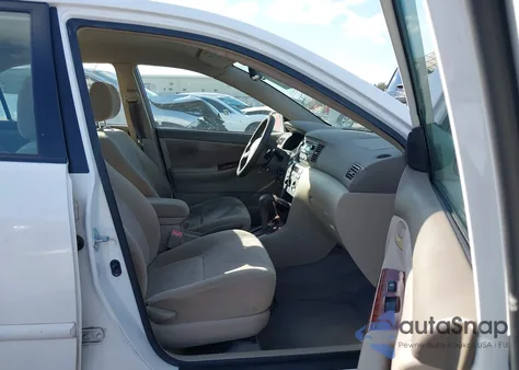 2005 Toyota Corolla Le z USA, uszkodzony, nr VIN JTDBR32EX52059142